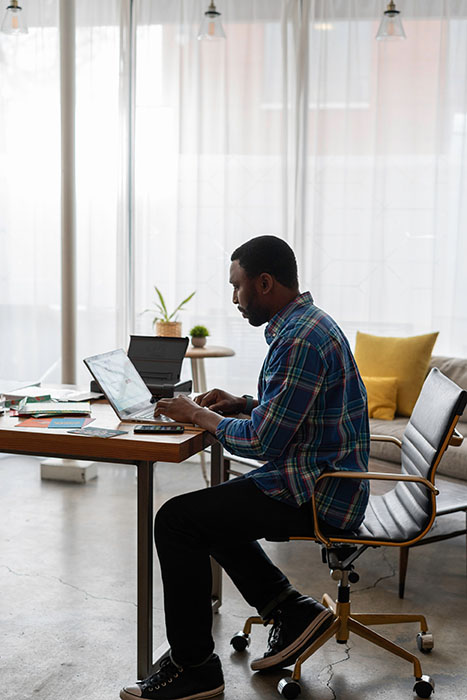 contact us man seated in desk